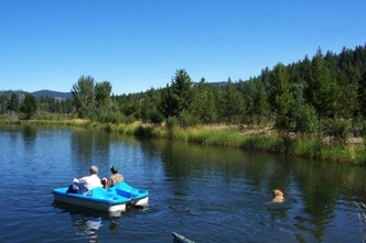 Paddleboat on pond